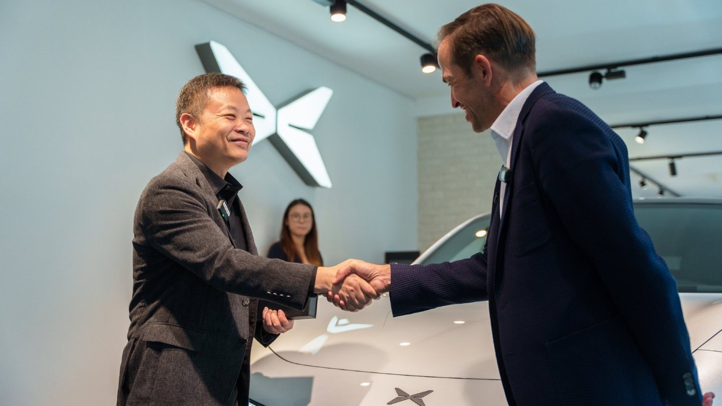 Xpeng chairman and CEO He Xiaopeng attends the first Mona L03 customer handover in France, held in Paris on October 13, 2026. Credit: Xpeng