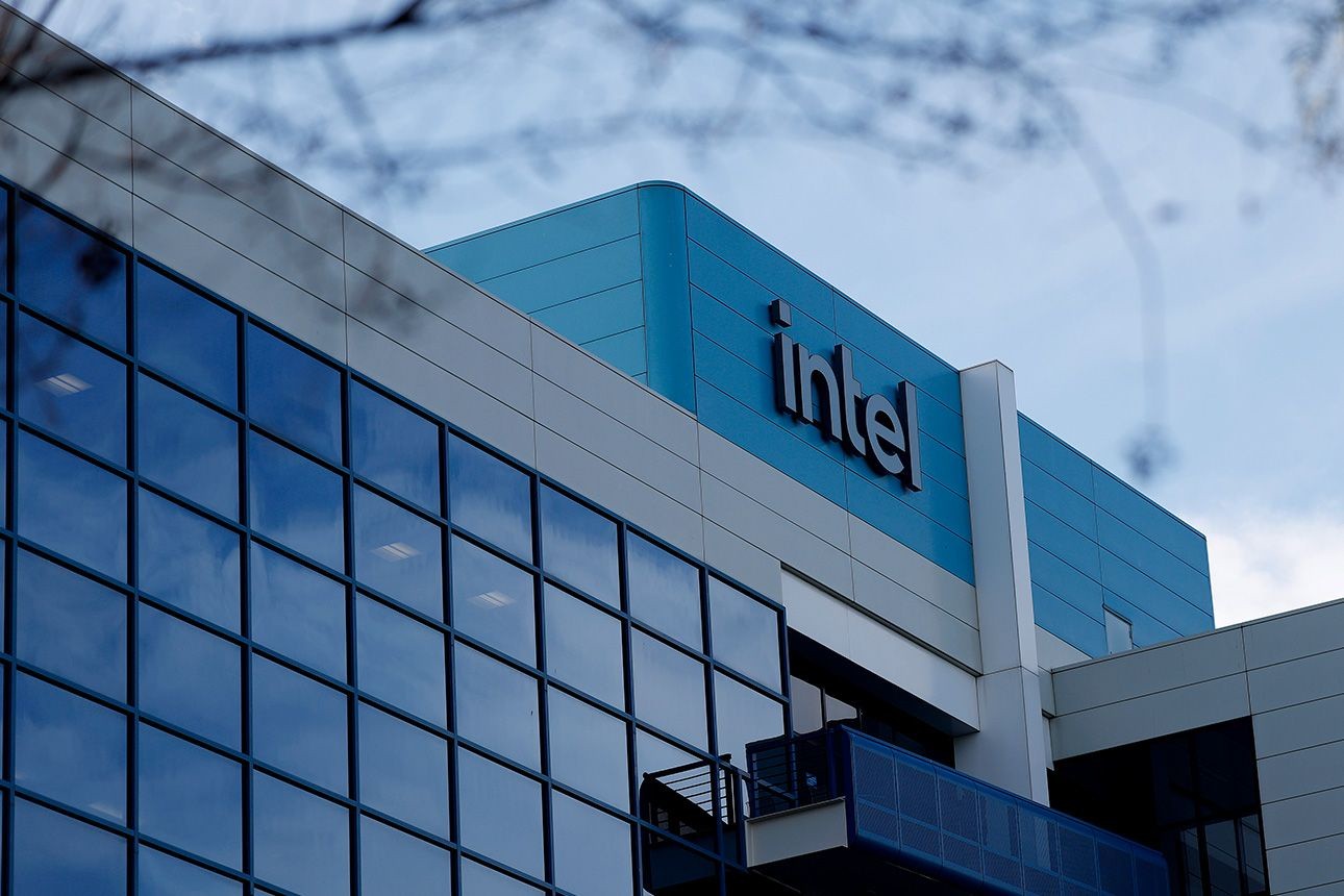 Intel logo on the blue facade of a modern glass office building