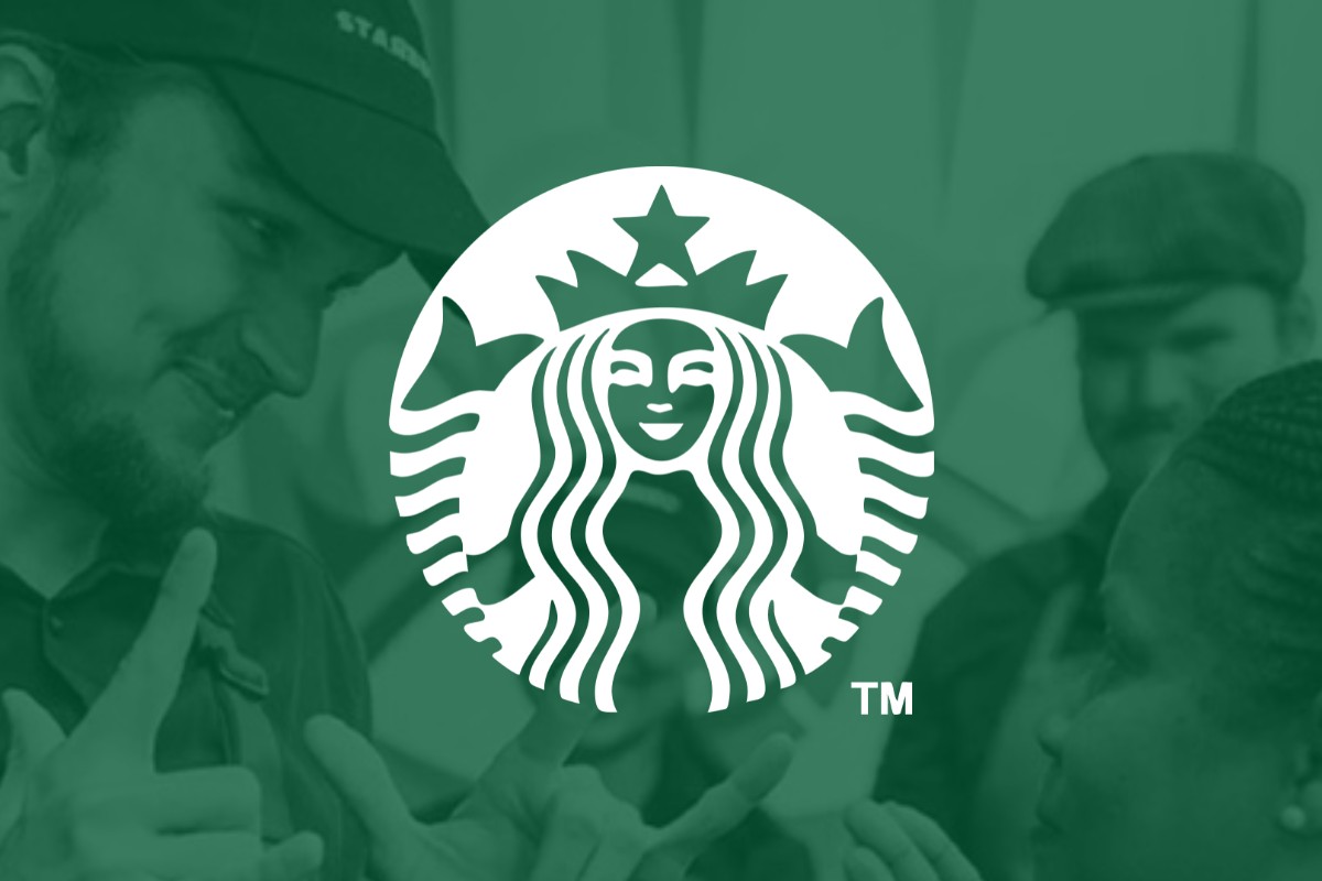 Starbucks logo overlaid on employees signing with their hands in a green-tinted background
