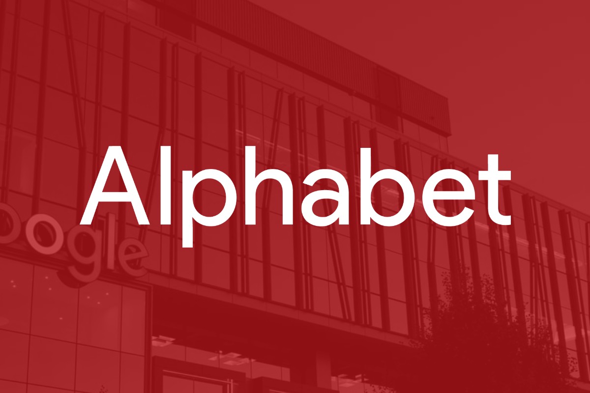 The Alphabet logo superimposed over an image of Google headquarters building.png