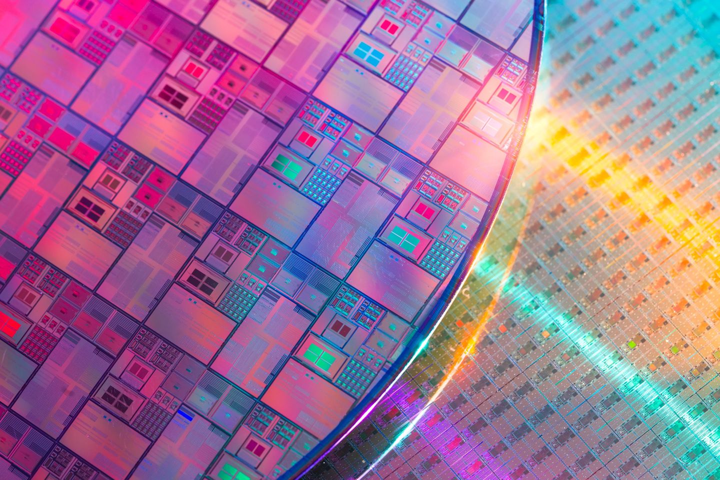 A silicon wafer with circuits printed on it.